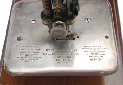 The serial No. 63902 dates this early machine to around 1864, which is the patent date on the stitchplate
